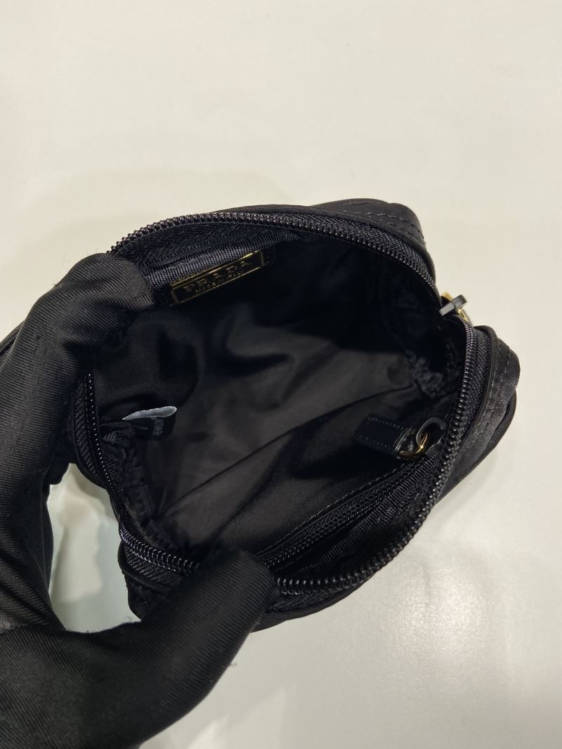 Pra*a clutch bags